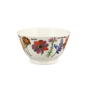 White bowl with floral designs on a white background