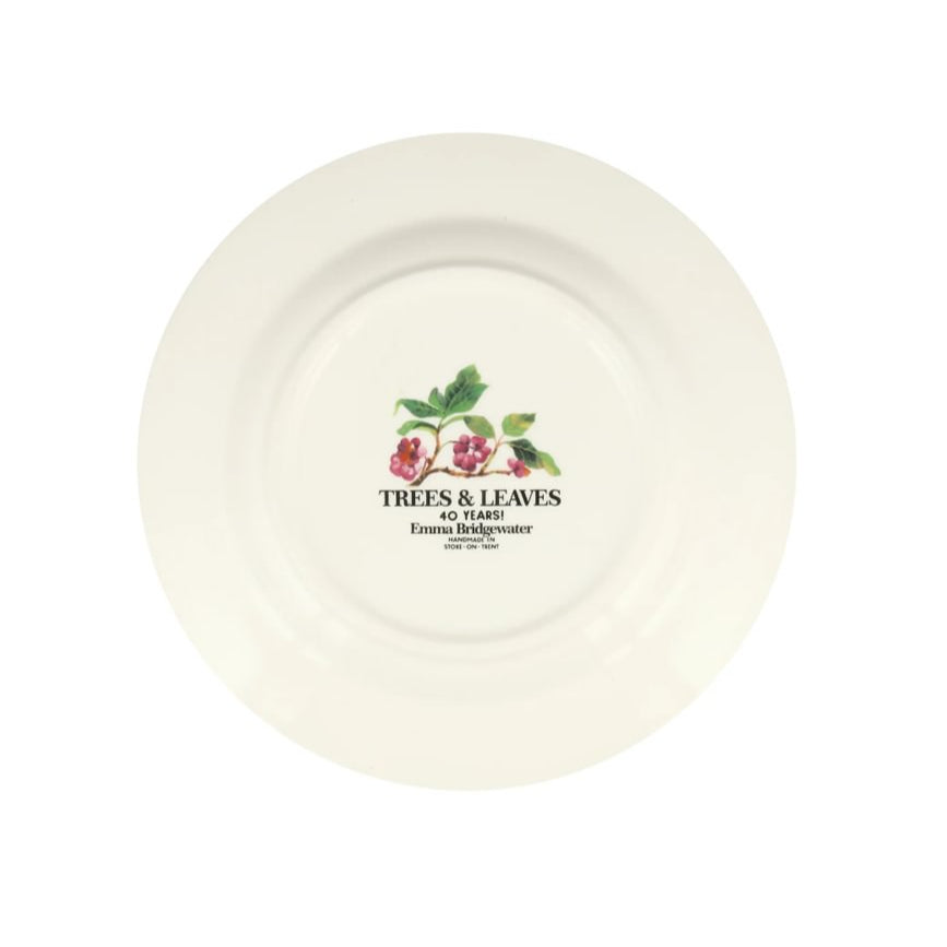 Round ceramic plate with floral design on a white background