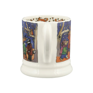 White mug with colorful animal illustrations on a white background